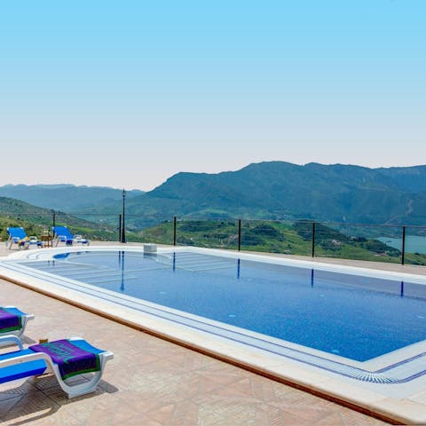 Take in the stunning landscape views as you swim in the private pool