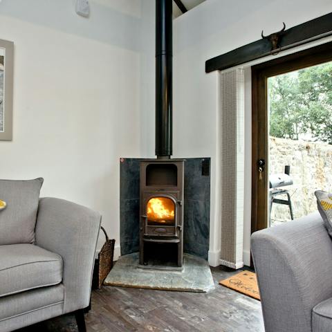 Get toasty in front of the wood-burning stove on chilly evenings