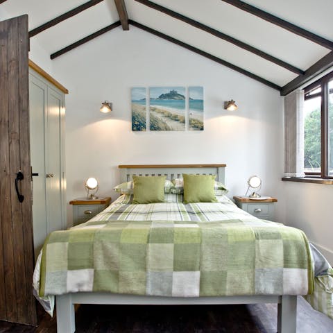 Sleep well underneath original timber beams in the cosy bedrooms