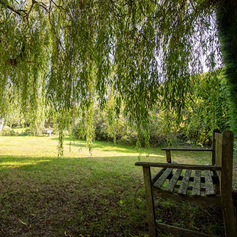Sit under the weeping willow with a good book, or enjoy some games on the generous lawn