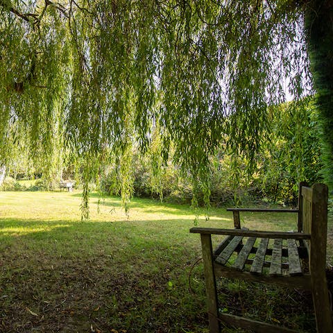 Sit under the weeping willow with a good book, or enjoy some games on the generous lawn
