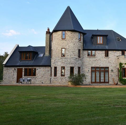 Stay in a wing of this chateau inspired home