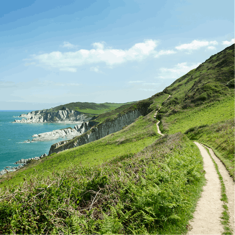 Explore Cornwall's scenic coastal trails, a ten-minute drive away
