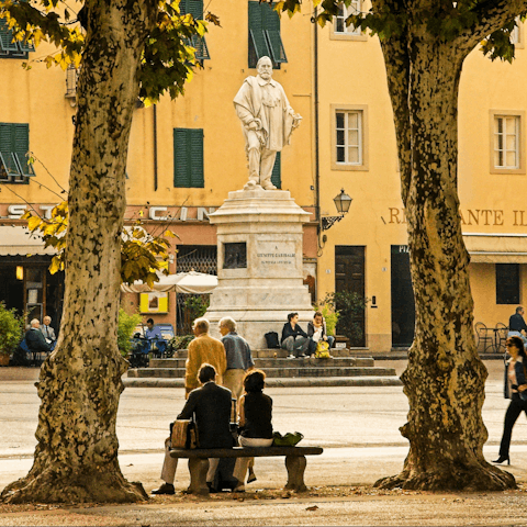 Take a moment to enjoy the atmosphere in a historic square 