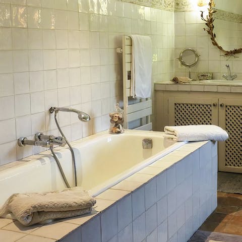 Unwind in the bath tub after a day of soaking up the nearby local villages