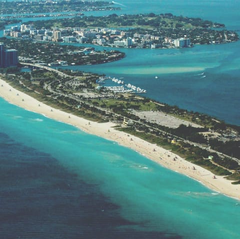 Take a stroll down famous Miami beaches, just a short drive away