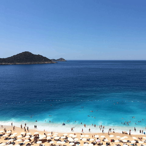 Swim in the blissful blue sea of Kalkan beach – it's only a ten-minute drive