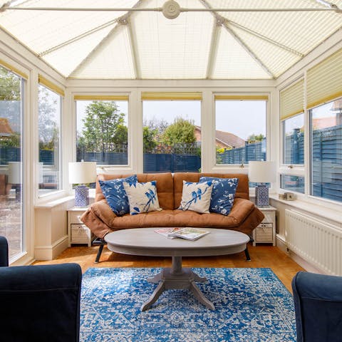 Curl up in your sunny conservatory while getting lost in a good book, glass of wine in hand