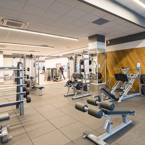 Head down to the gym on the building's ground floor and pump some serious iron