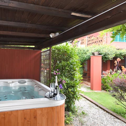 Toast the day's end from the private Jacuzzi