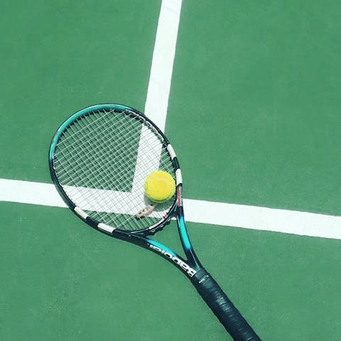 Play a game of tennis at the private community tennis courts nearby