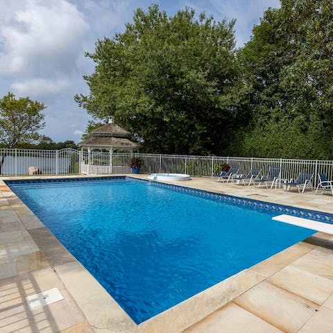 Dive into the heated pool or admire the views from the poolside loungers
