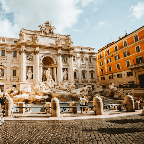 Visit the Trevi Fountain, a breezy seventeen-minute walk away