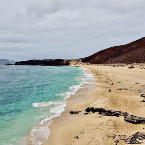 Walk along the sweeping beaches of Playa Blanca, only minutes away
