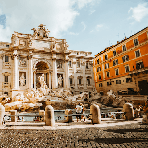 Throw a coin in the Trevi Fountain, just a fifteen-minute stroll from home