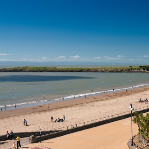 Spend a day on Barry Island's Blue Flag beach, a thirty-minute drive away