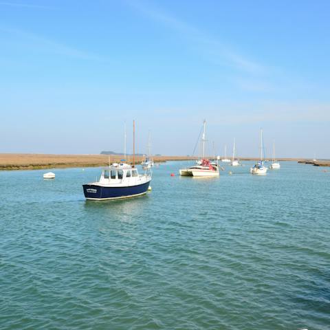 Watch the boats go by in the day, and feast on fresh fish and chips by night