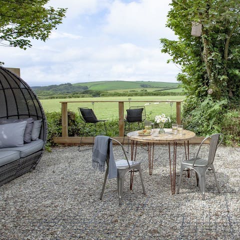 Sit down to an alfresco barbecue meal while feasting on glorious countryside views