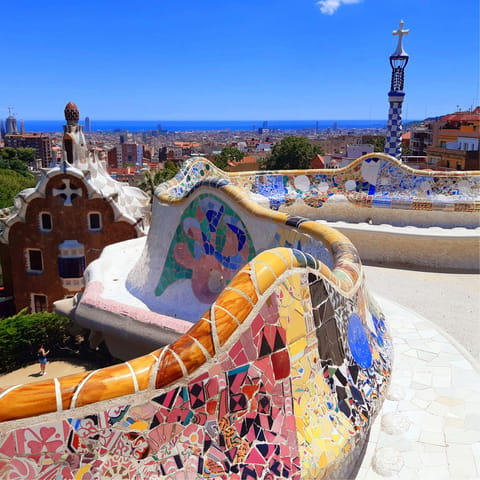 Admire the mosaics at nearby Parc Güell