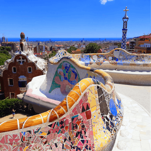 Admire the mosaics at nearby Parc Güell