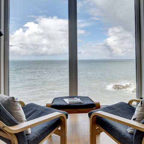 Spot porpoises, oystercatchers and seals through the full-height windows