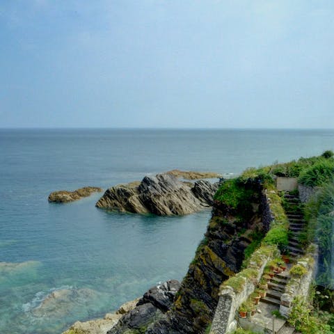 Stroll down to the beach along the rugged coastline