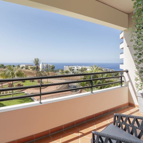 Look out to glistening sea views from your private balcony