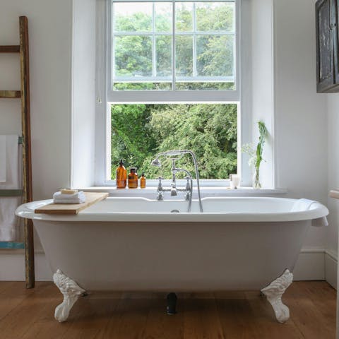 Sink into the clawfoot tub and enjoy a long soak