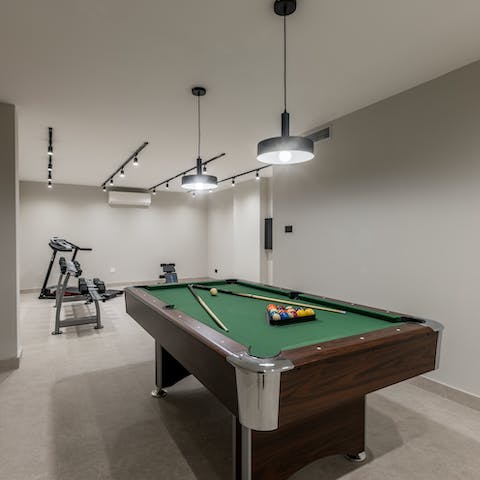 Shoot a game of pool or work up a sweat in the recreation room