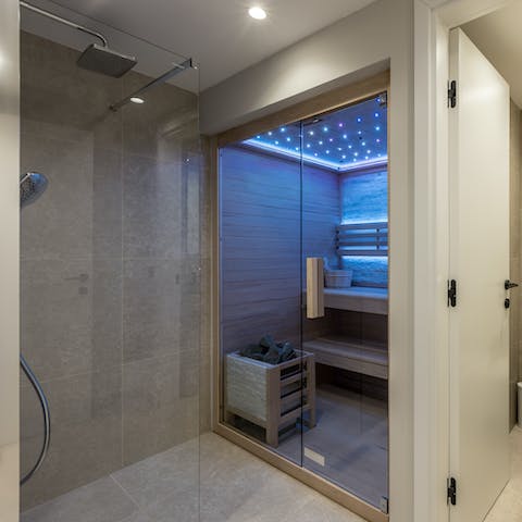 Relax and unwind in the private sauna