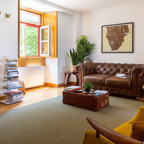 Pick an interesting book from your host's collection to read on the Chesterfield