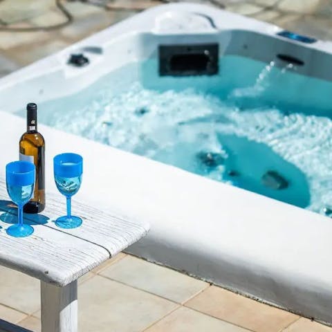 Unwind after a day of exploring the coast in the private hot tub