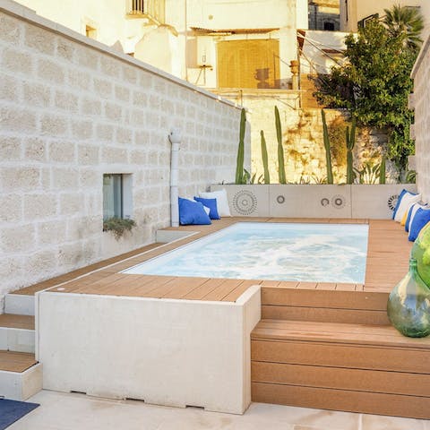 Enjoy a quick dip in the small, heated Jacuzzi-style pool