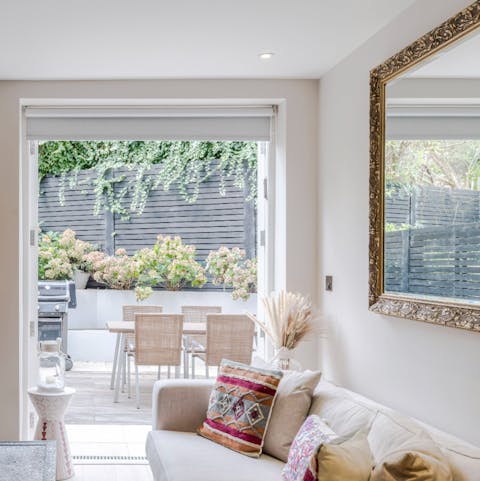 Step out to your private patio from the French doors in the lounge