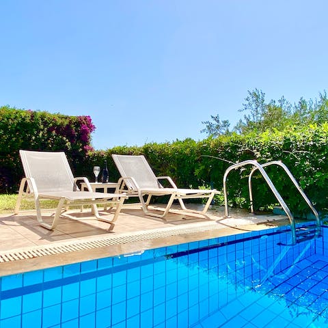 Enjoy a refreshing dip in your private pool to cool off from the Greek heat