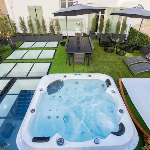 Unwind in the hot tub after a day of exploring the town