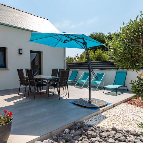 Enjoy an alfresco lunch on your private sun-dappled terrace