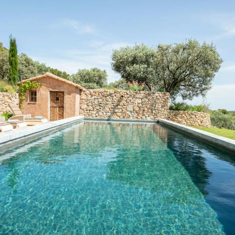 Gaze out at the Massif des Maures from the comfort of the swimming pool