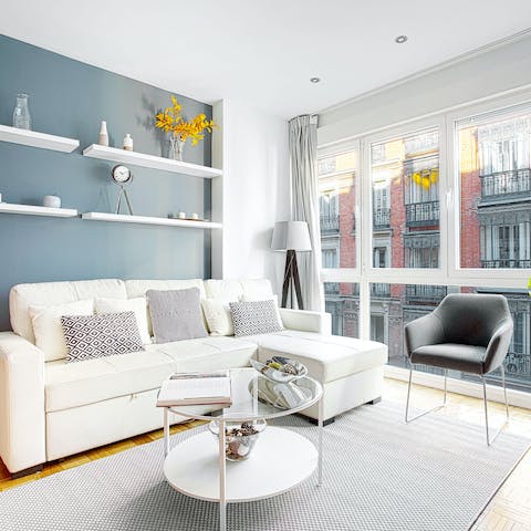 Spend mornings with coffee on the sofa as the light pours in