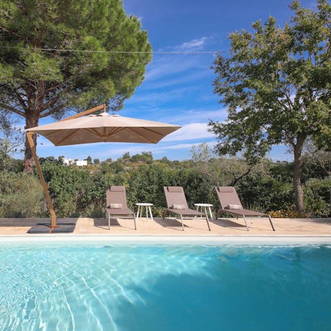 Lie back on the sun loungers by the private pool in the summer months