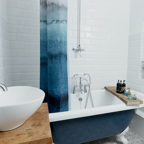 Run yourself a rejuvenating bath in the freestanding tub