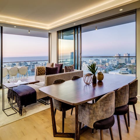 Enjoy stellar views of the ocean and surrounding city through the floor-to-ceiling windows of the home