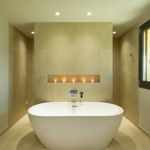 Unwind in the main bedroom's Jacuzzi tub or the sauna