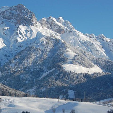 Hop in the car or ski bus for four minutes to reach the slopes of Hochkönig