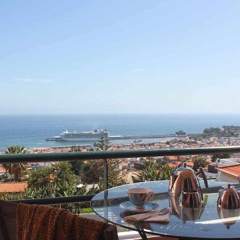 Sip your morning coffee overlooking Funchal harbour