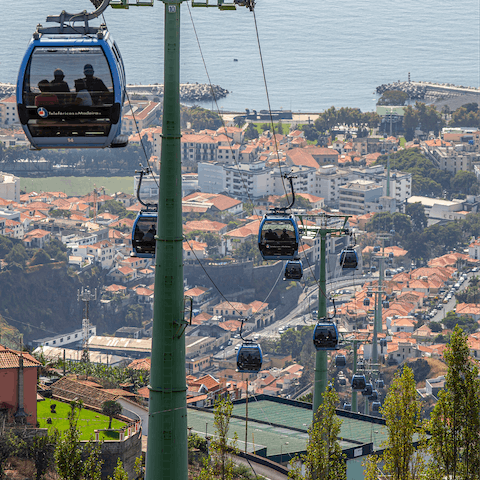 Ride the scenic cable car up to Monte before a wicker sled ride all the way back down