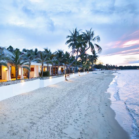 Step outside and onto white sand thanks to direct access to Mae Nam beach