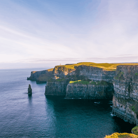 Marvel at the breathtaking scenery on show at the Cliffs of Moher, 77km away