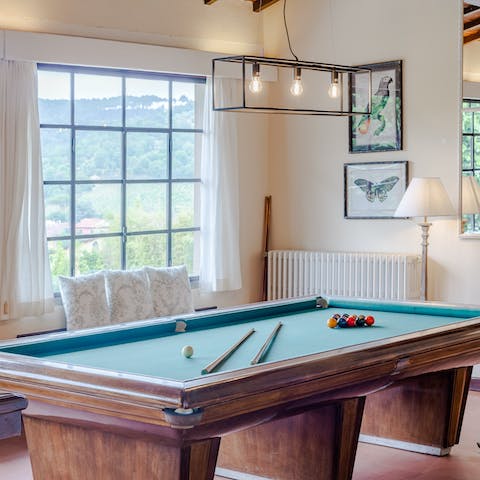 Get competitive playing billiards in the upstairs living room