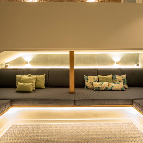 Immerse yourself in another world in the cosy cinema room